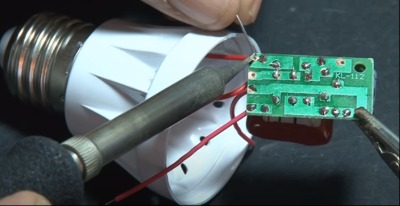 Solder the power unit to the metal casing